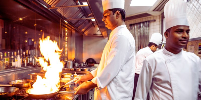 Restaurant supply store in Miami. A group of chefs in a restaurant kitchen